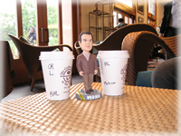 Bobblehead has Coffee